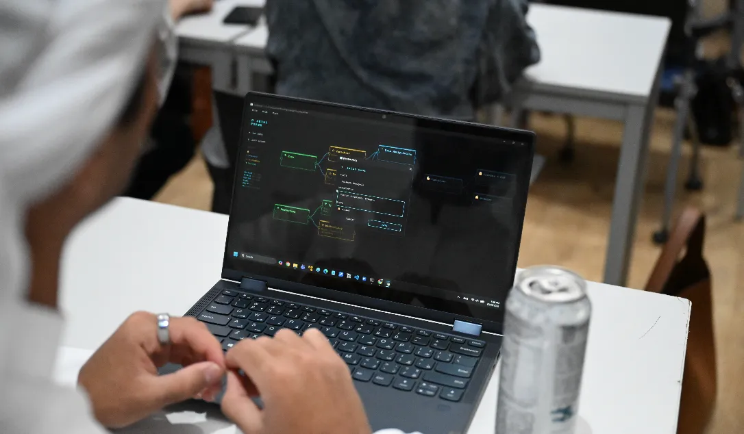 Students learning penetration testing techniques during Day 1 at Khalifa University