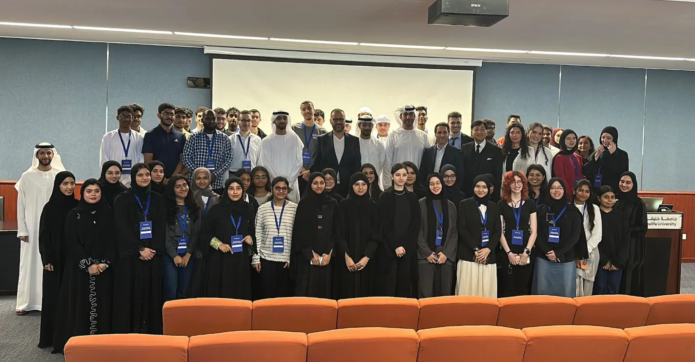 Group photo of Summer School participants, faculty, and organizers at Khalifa University